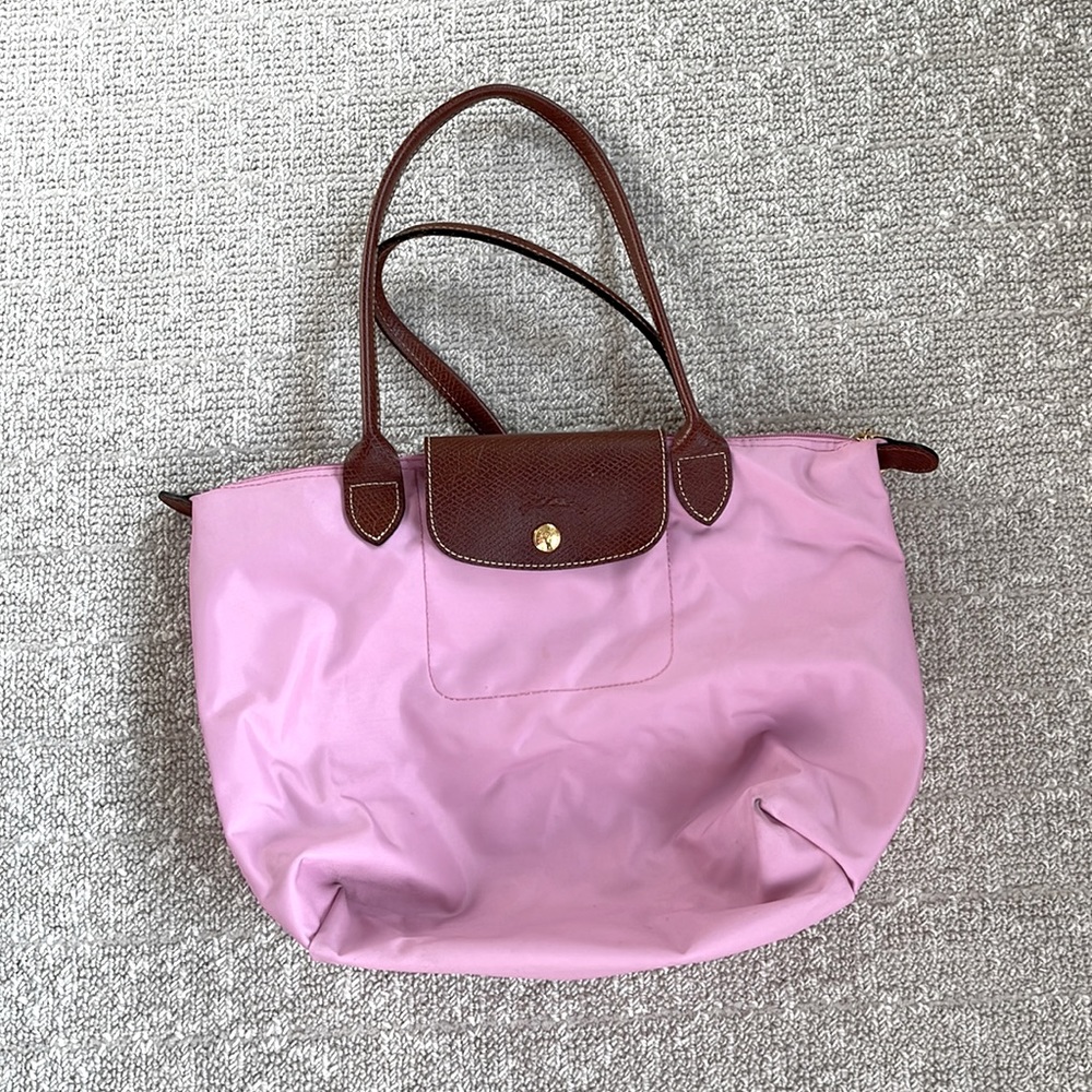 Longchamp le Pliage pink small top handle bag